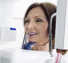 Woman receiving 3 D scan of her jaw