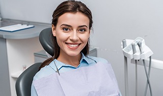 Female dental patient after receiving veneers in Burlington