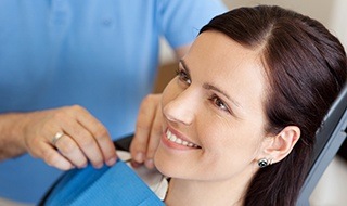 Woman receiving dental treatment