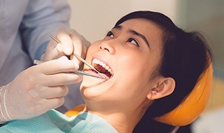 Young woman receiving dental treatment