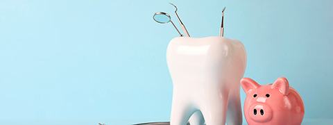 Senior man sitting in dental chair smiling