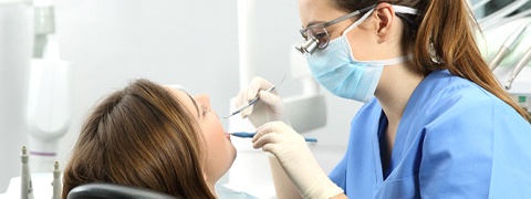 patient getting their teeth cleaned