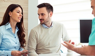 Man and woman during dental consultation