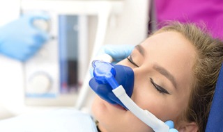 woman eyes closed receiving nitrous oxide