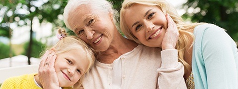 Smiling mother grandmother and daughter