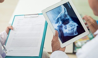 X-ray of skull on tablet computer