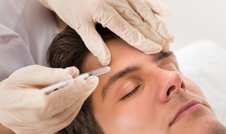 Man receiving Botox injections